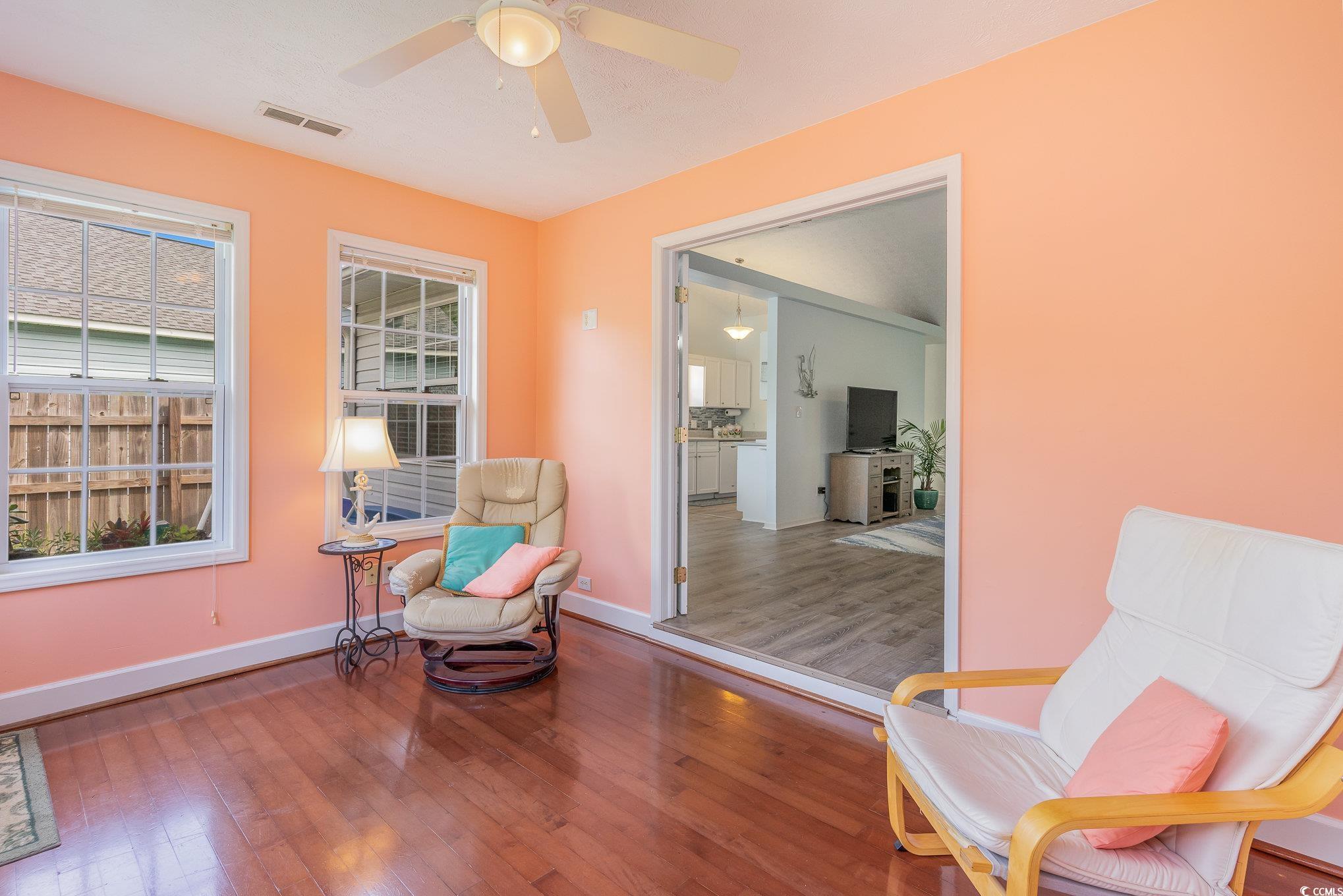 7966 Spruce Lane Murrells Inlet, SC 29576 - Photo 15 of 31 Entryway featuring ceiling fan and light wood-type
