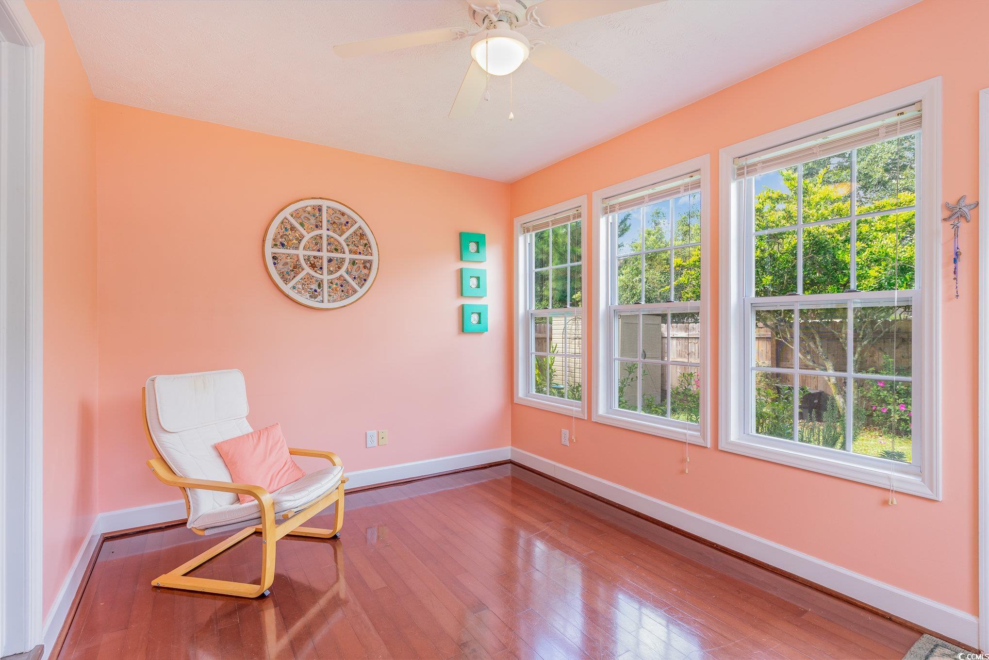 7966 Spruce Lane Murrells Inlet, SC 29576 - Photo 16 of 31 Living area featuring ceiling fan and a wealth of
