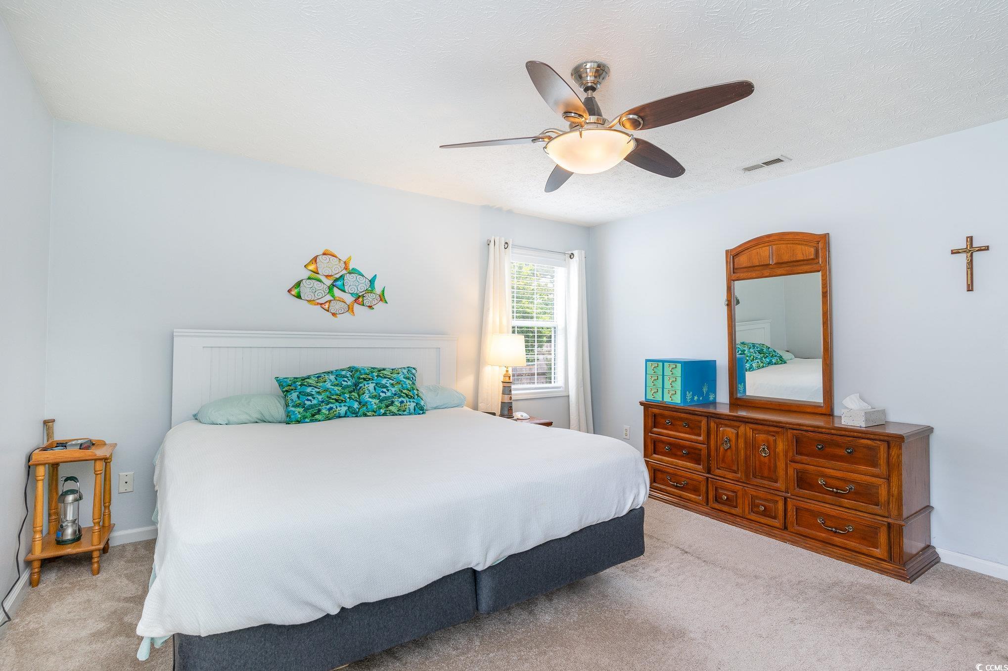 7966 Spruce Lane Murrells Inlet, SC 29576 - Photo 19 of 31 Living area featuring a healthy amount of sunlight