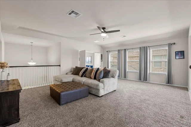a kitchen with a stove and a refrigerator