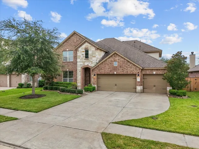an aerial view of a house with garden