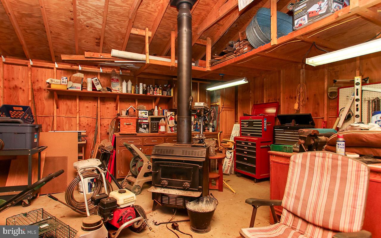 4420 Mt Carmel Road Hampstead, MD 21074 - Photo 41 of 63 Wood stove in detached two car garage