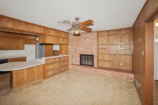 a view of a livingroom with a fireplace