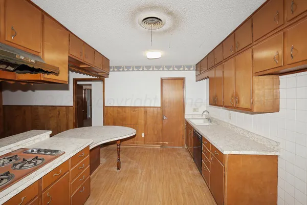 a bathroom with a sink a double vanity and a mirror