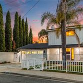 a view of a house with a street