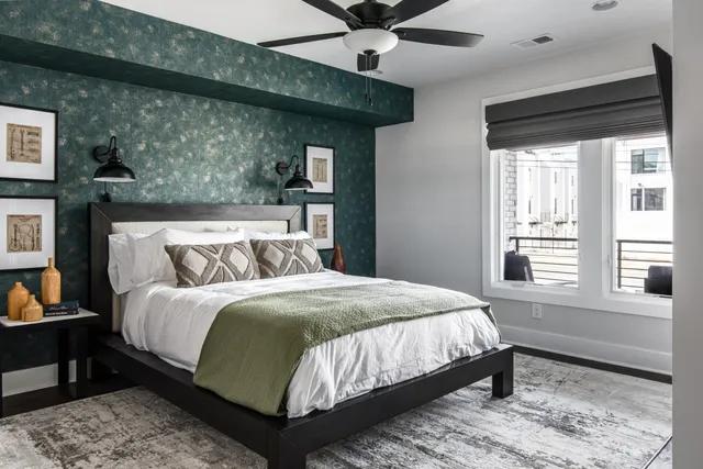 a bedroom with a bed and window