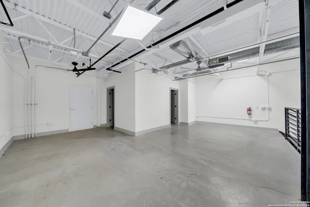 a view of a room with an empty space