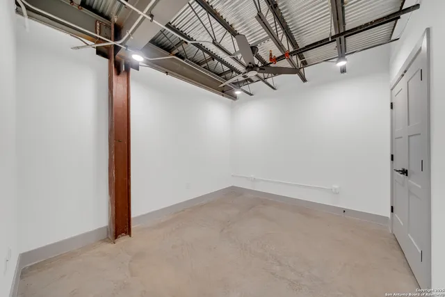 a view of a street with a building