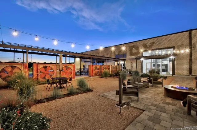 a view of a balcony with chairs