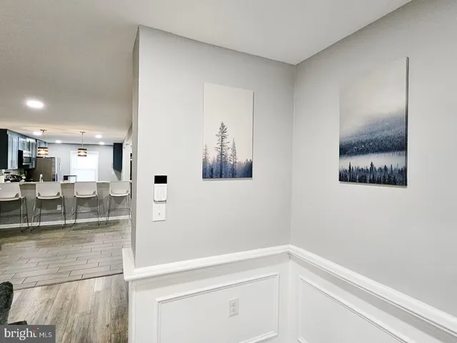 a view of a hallway with staircase