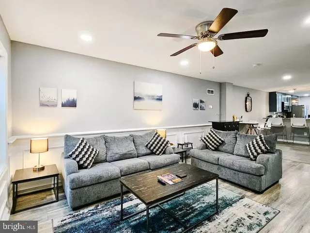 a living room with furniture and a couch