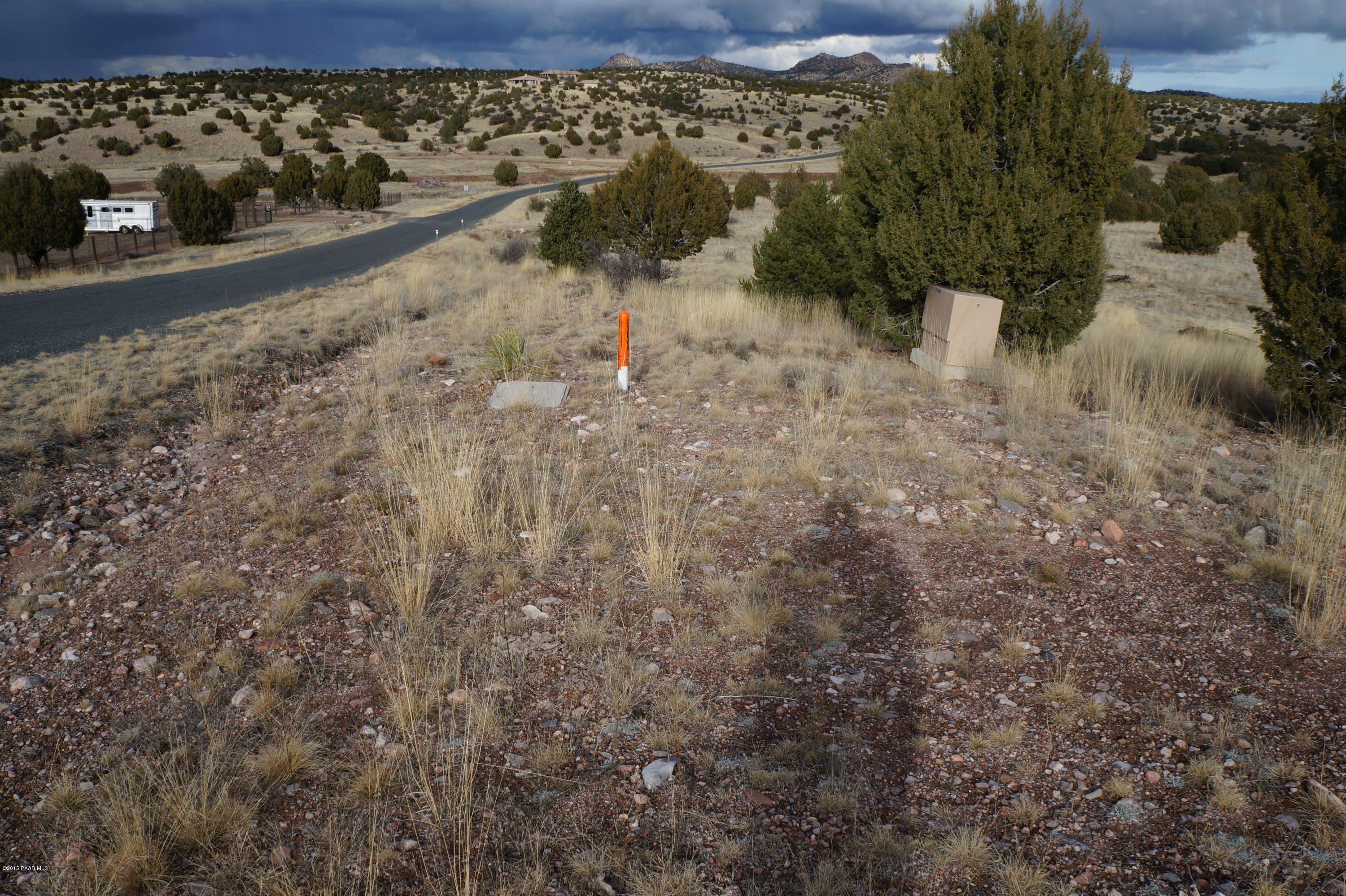 17201 Crossroads Ranch Road Prescott, AZ 86305 - Photo 23 of 27 a view of a yard with wooden fence