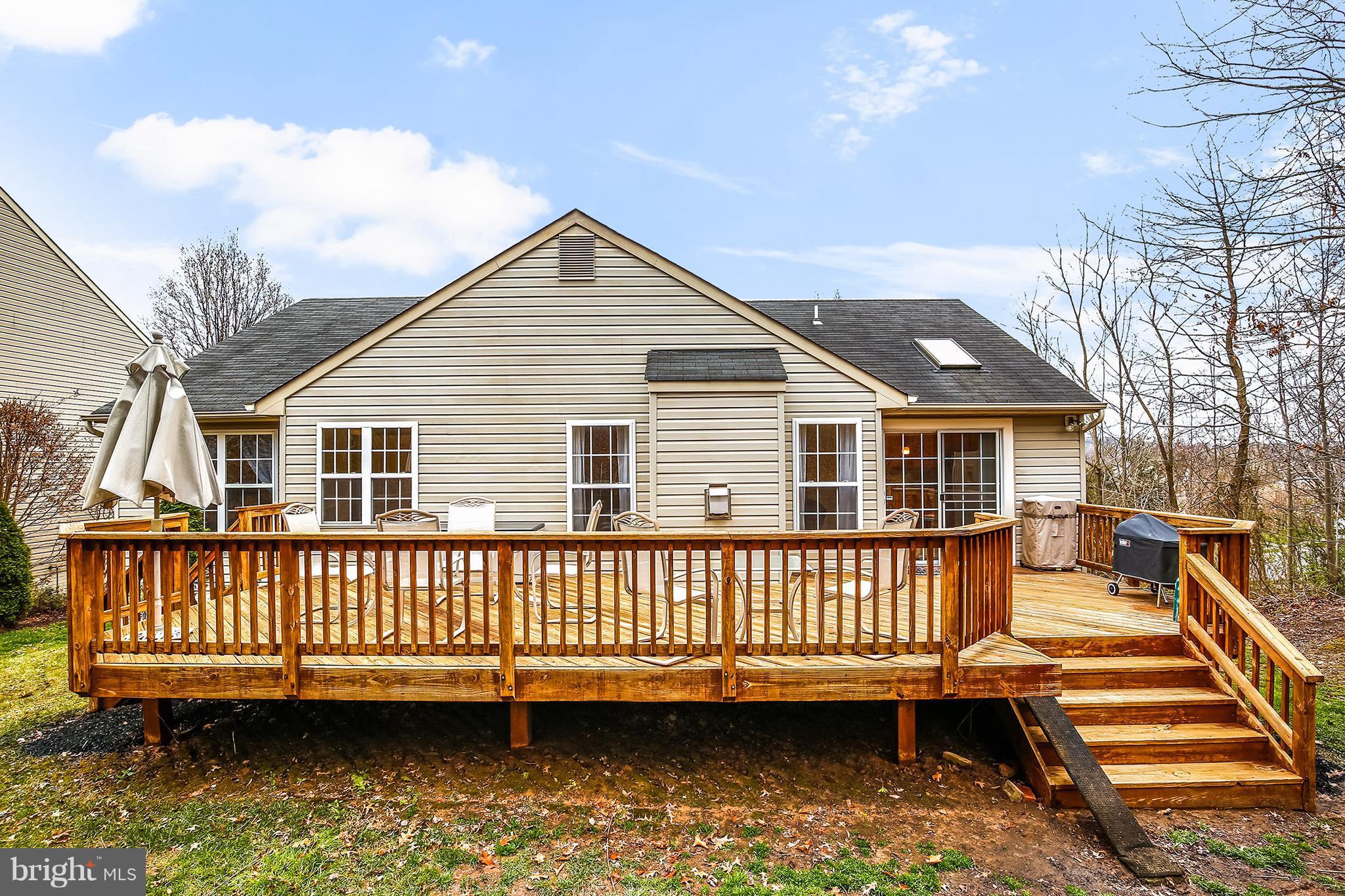 6319 Patuxent Quarter Road Hanover, MD 21076 - Photo 29 of 30 Large deck off of the kitchen, backs to trees.
