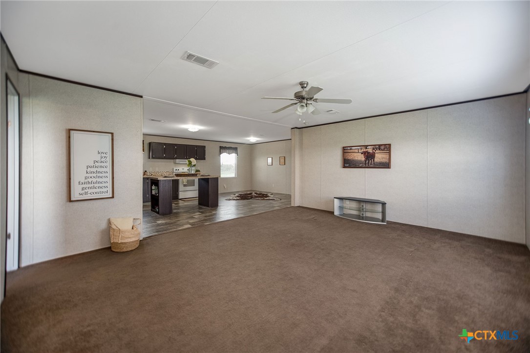 1849 Royal Road Port Lavaca, TX 77979 - Photo 14 of 40 a view of a livingroom with furniture and a fireplace