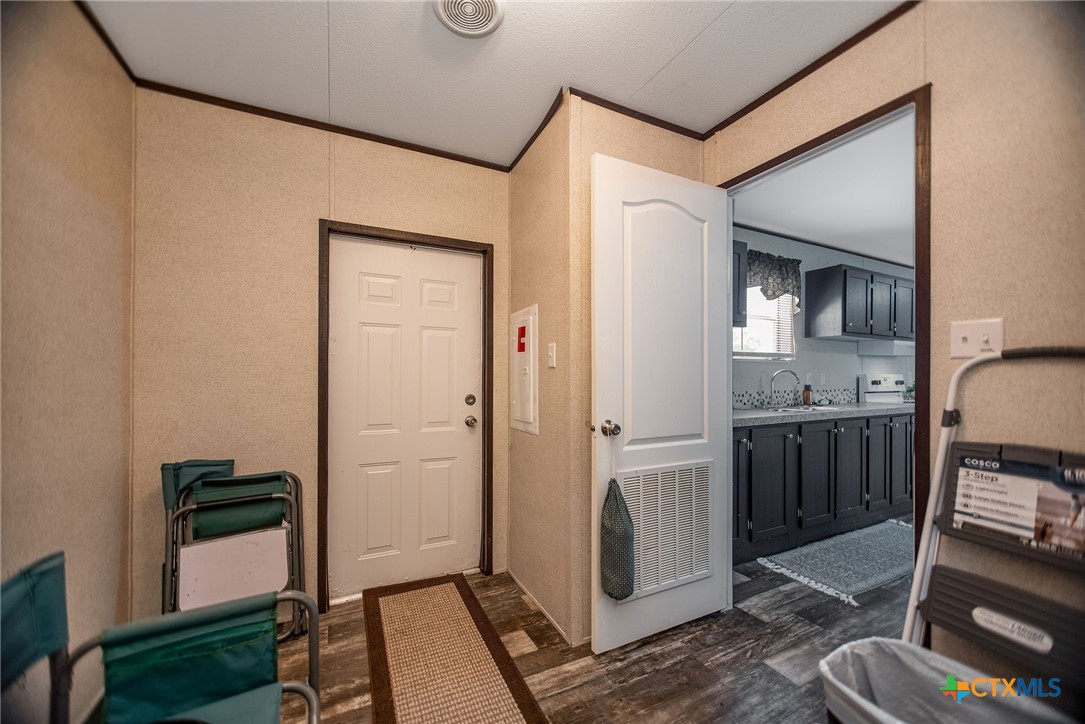 1849 Royal Road Port Lavaca, TX 77979 - Photo 20 of 40 a kitchen with a refrigerator and a stove