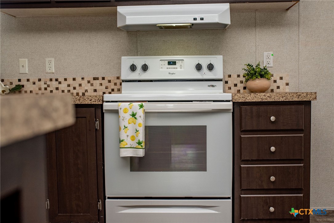 1849 Royal Road Port Lavaca, TX 77979 - Photo 33 of 40 a utility room with cabinets and window
