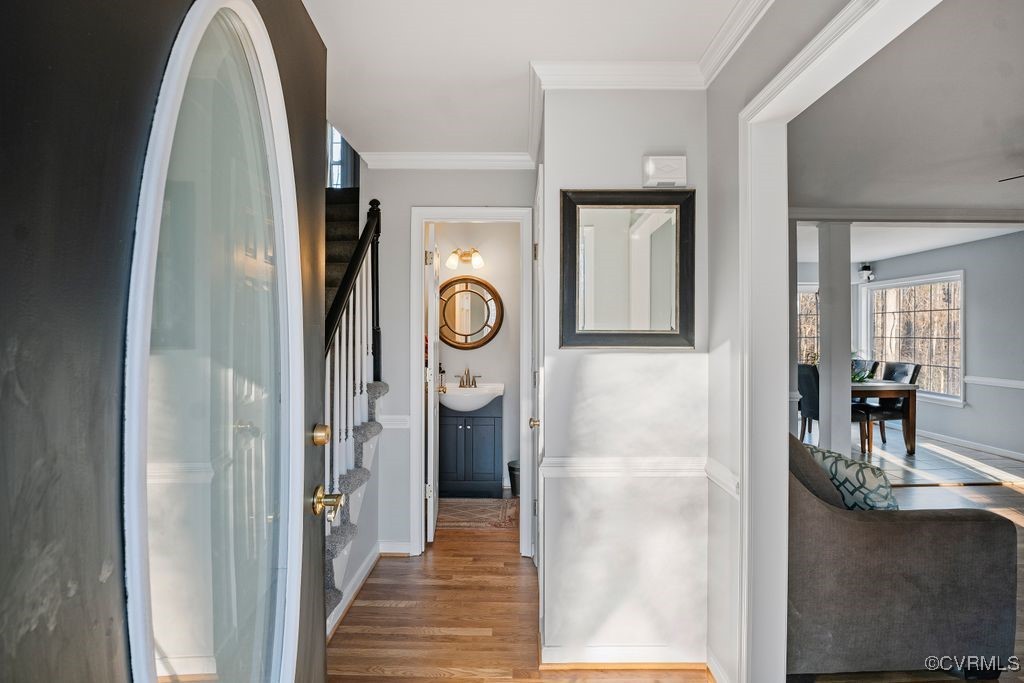 4360 Worsham Road Powhatan, VA 23139 - Photo 5 of 30 Corridor with baseboards, stairway, wood finished