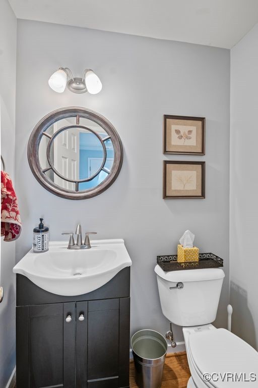 4360 Worsham Road Powhatan, VA 23139 - Photo 6 of 30 Bathroom featuring toilet, wood finished floors, a