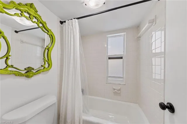 a bathroom with a sink and bathtub