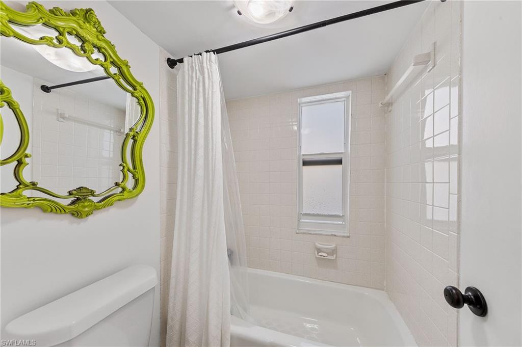 171 Quails Nest Road, Unit 3 Naples, FL 34112 - Photo 21 of 50 a bathroom with a sink and bathtub