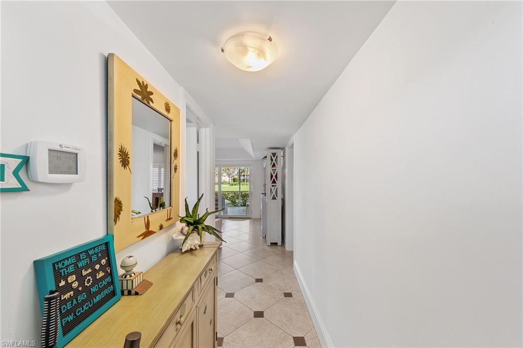 171 Quails Nest Road, Unit 3 Naples, FL 34112 - Photo 5 of 50 a very nice looking room with a large window