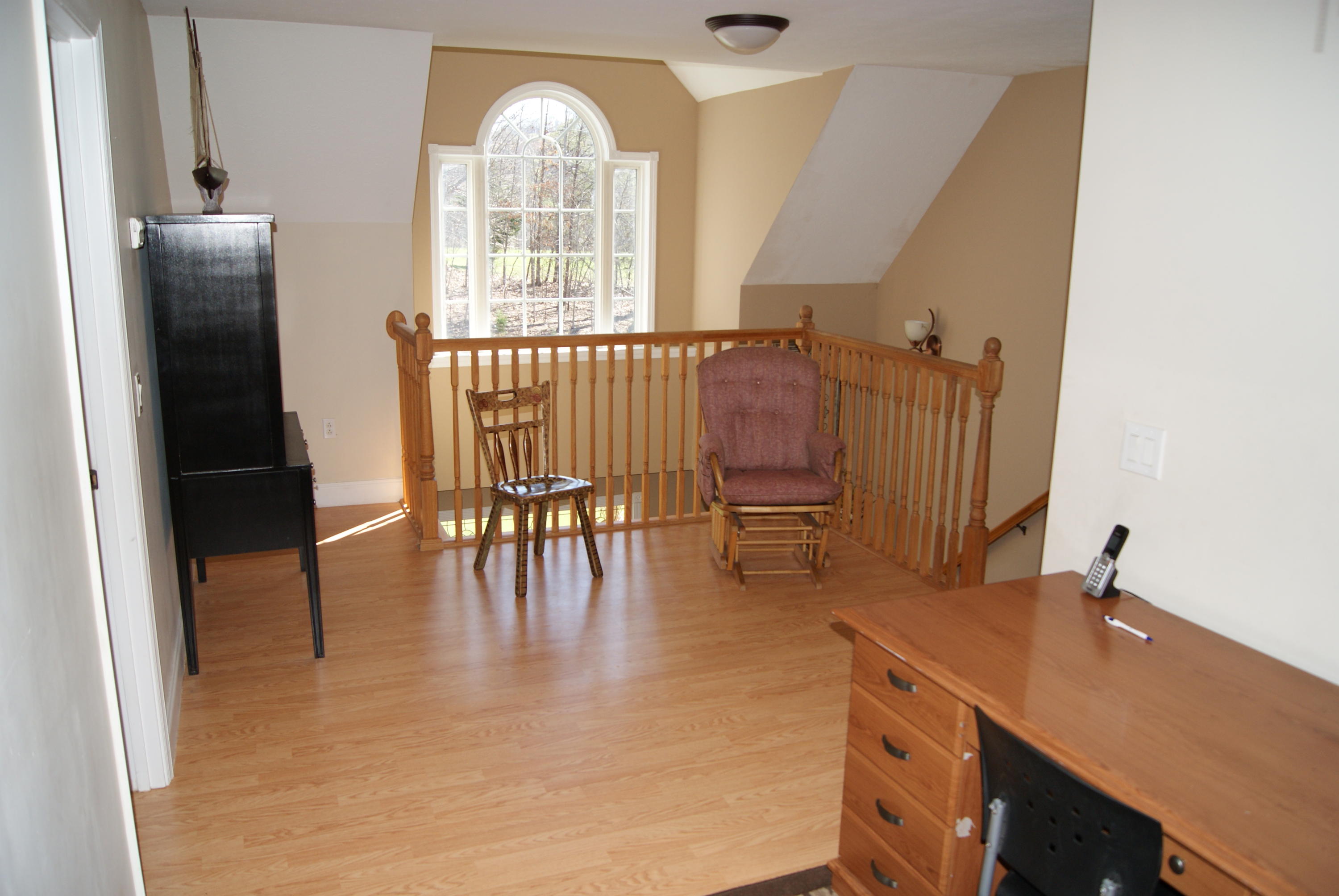 4412 Roaring Run Road Goode, VA 24556 - Photo 6 of 6 a view of a kitchen with furniture and a window