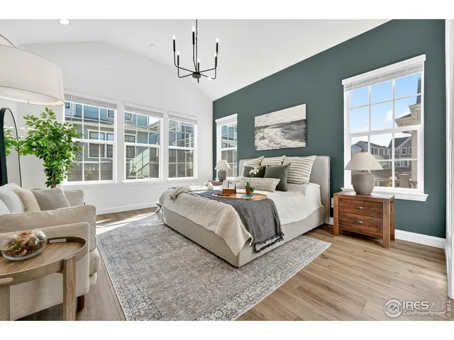 a bed room with a bed and a window