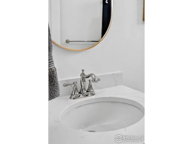 a bathroom with a tub and a sink