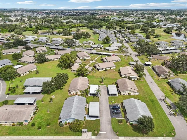 an aerial view of a house with a garden