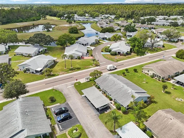 an aerial view of a house with a garden