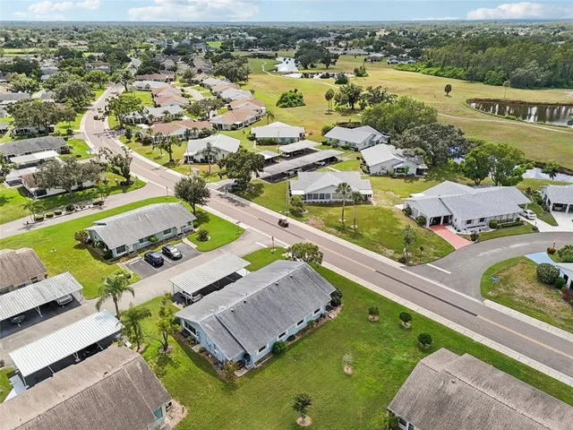 an aerial view of a house with a garden
