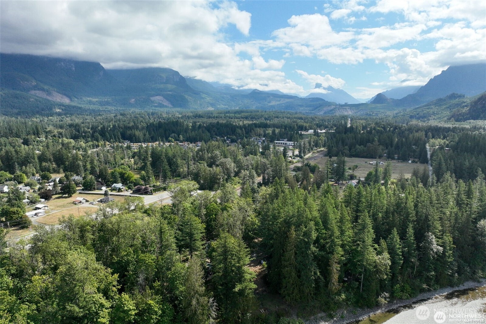 1212 Croft Avenue Gold Bar, WA 98251 - Photo 16 of 18 a view of a city with lush green forest