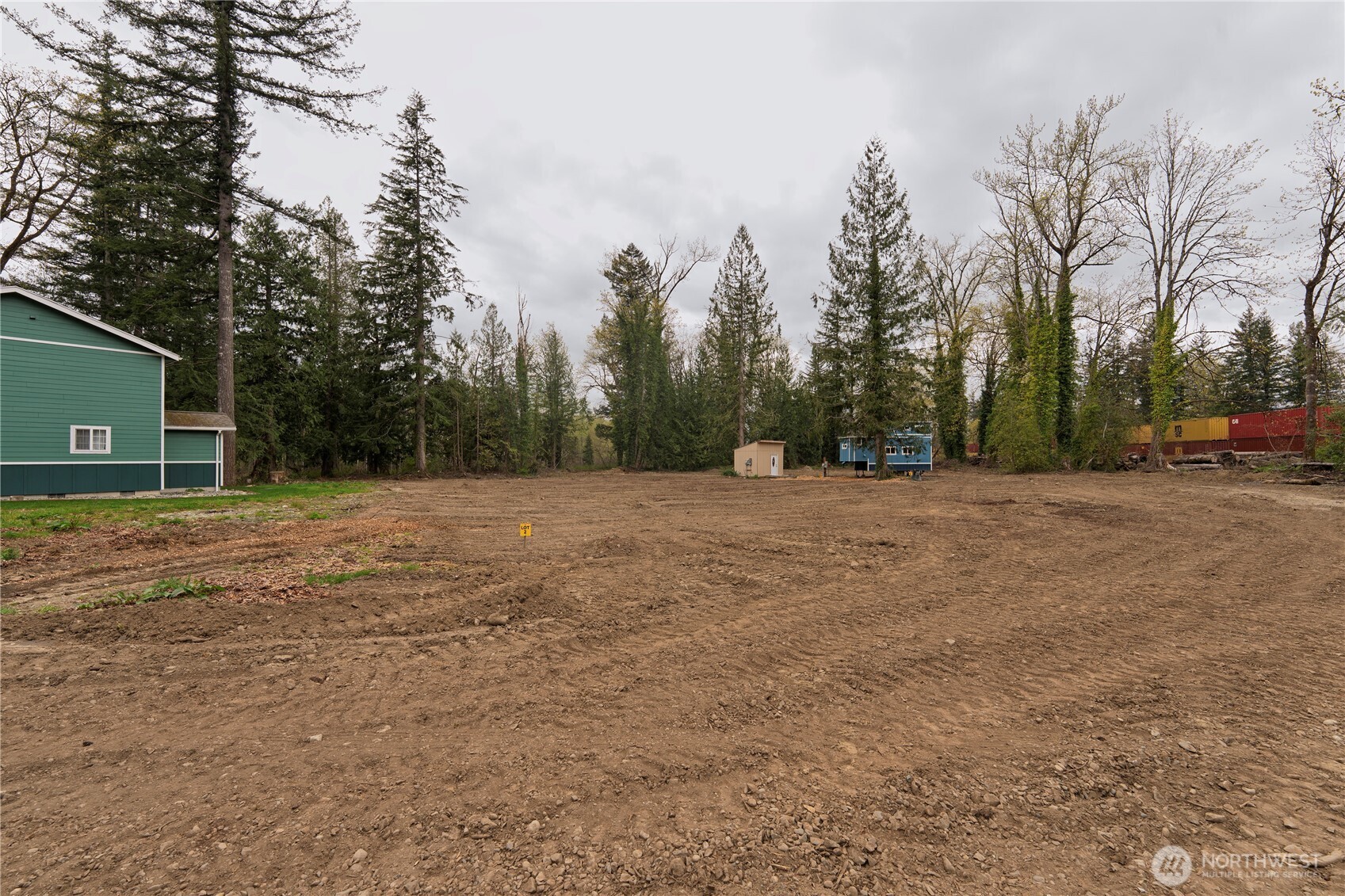 1212 Croft Avenue Gold Bar, WA 98251 - Photo 3 of 18 a view of a yard with a trees