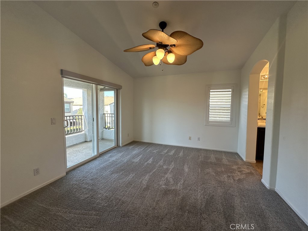 25190 Crest Haven Street, Unit 2 Murrieta, CA 92562 - Photo 17 of 30 an empty room that has a window