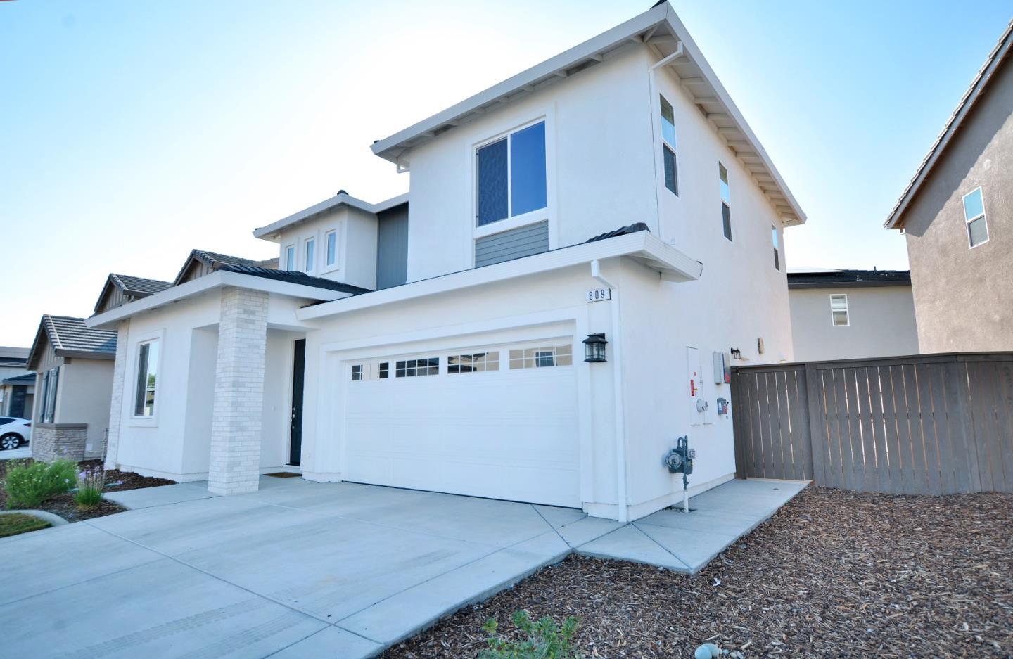 809 Big Range Way Rocklin, CA 95765 - Photo 2 of 31 a view of a white house with a large space