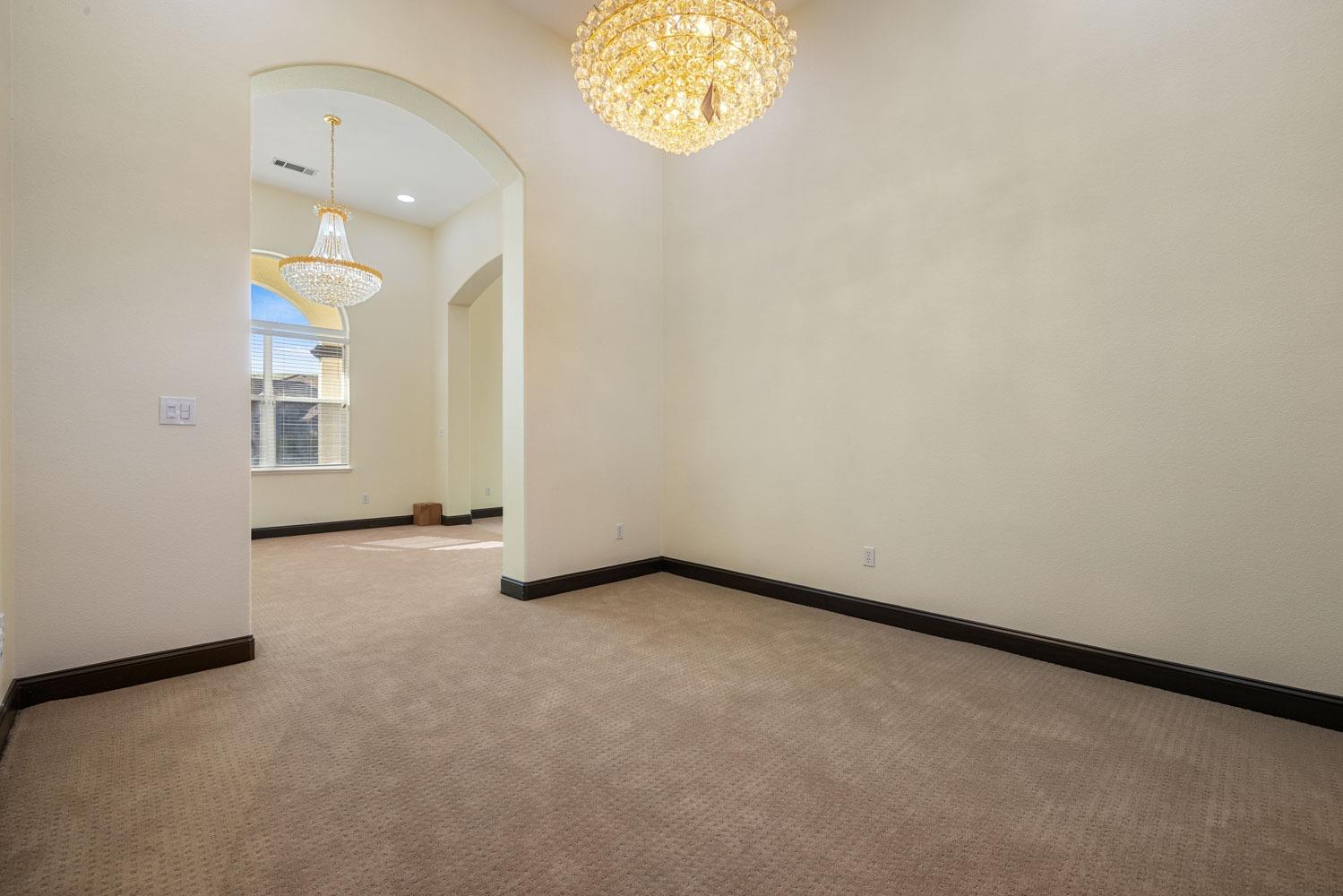 5106 Watkings Way Antioch, CA 94531 - Photo 12 of 50 an empty room with windows and entrance