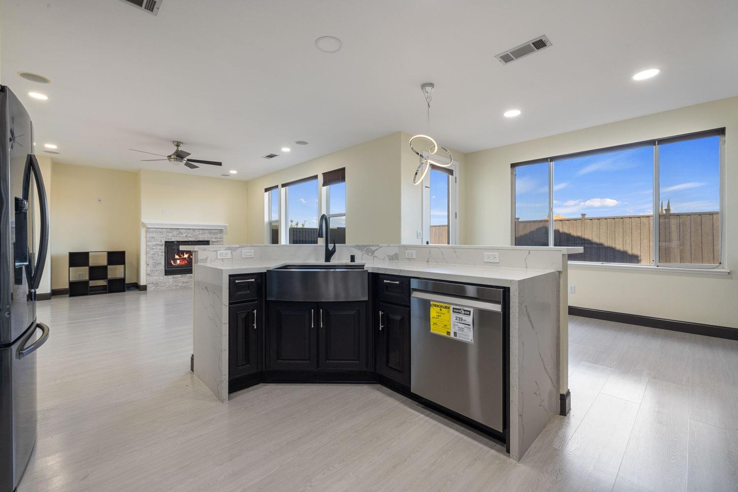 5106 Watkings Way Antioch, CA 94531 - Photo 17 of 50 a kitchen with a sink stove and cabinets