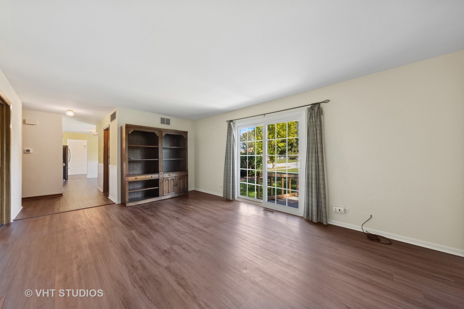 1623 South Prospect Street Wheaton, IL 60189 - Photo 11 of 26 wooden floor in an empty room with a window