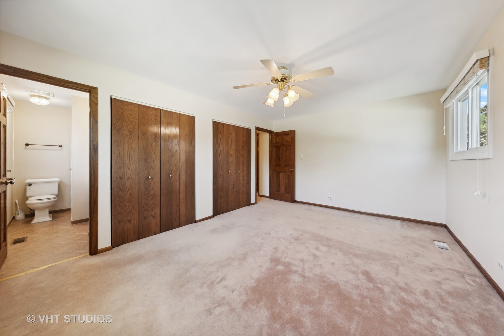 1623 South Prospect Street Wheaton, IL 60189 - Photo 13 of 26 a view of a livingroom with a chandelier fan and hardwood floor
