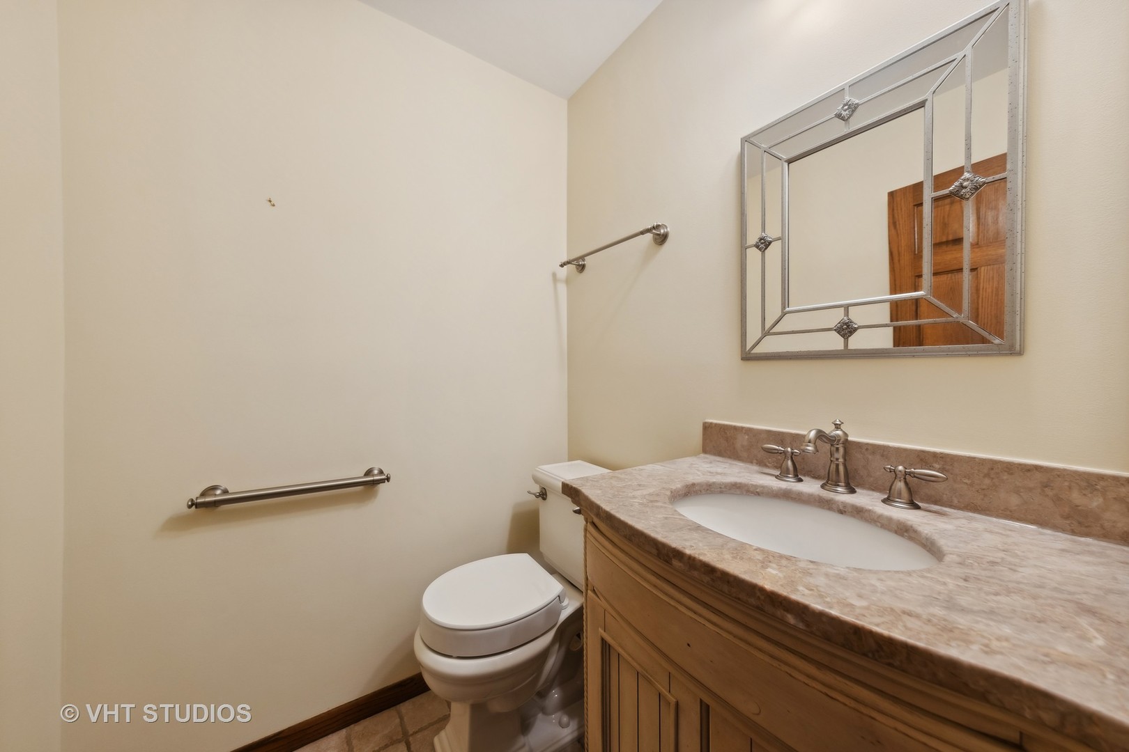 1623 South Prospect Street Wheaton, IL 60189 - Photo 20 of 26 a bathroom with a granite countertop sink toilet and mirror