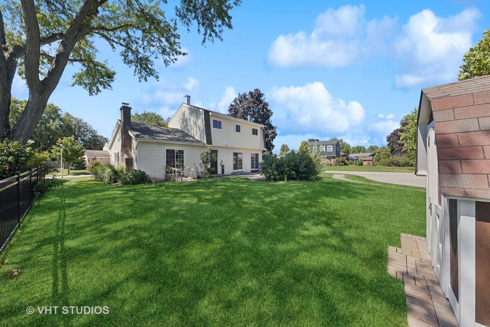 1623 South Prospect Street Wheaton, IL 60189 - Photo 22 of 26 a front view of a house with garden