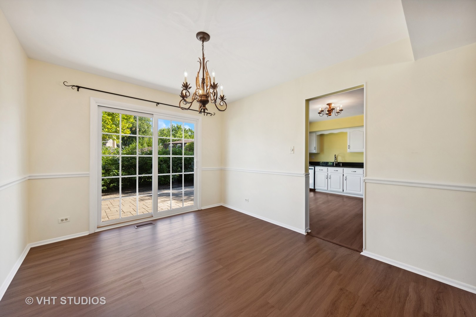 1623 South Prospect Street Wheaton, IL 60189 - Photo 7 of 26 a view of a room with wooden floor and windows