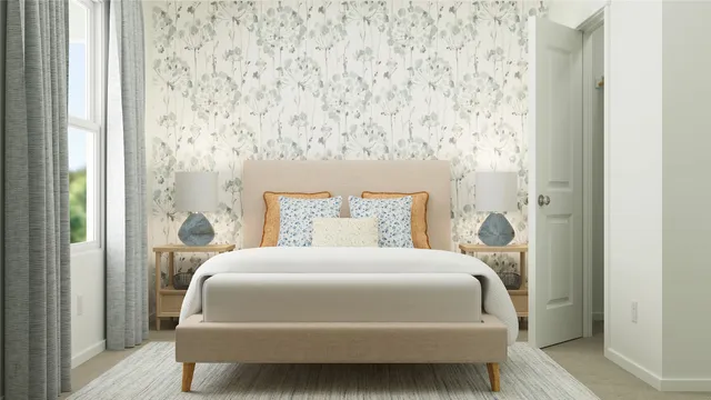 a bedroom with a bed and a mirror