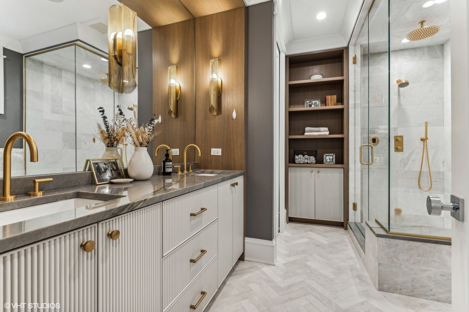 2034 North Mohawk Street, Unit 1 Chicago, IL 60614 - Photo 14 of 26 a bathroom with a double vanity sink a mirror and a shower