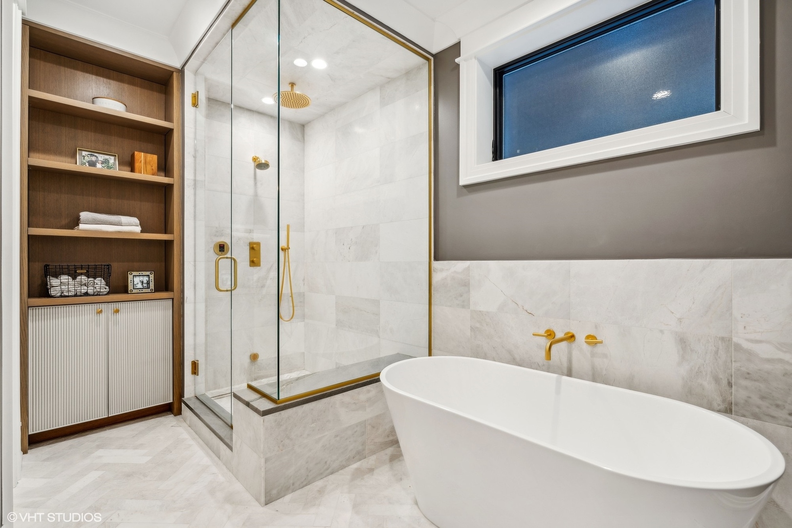 2034 North Mohawk Street, Unit 1 Chicago, IL 60614 - Photo 16 of 26 a bathroom with a tub a sink and a large mirror