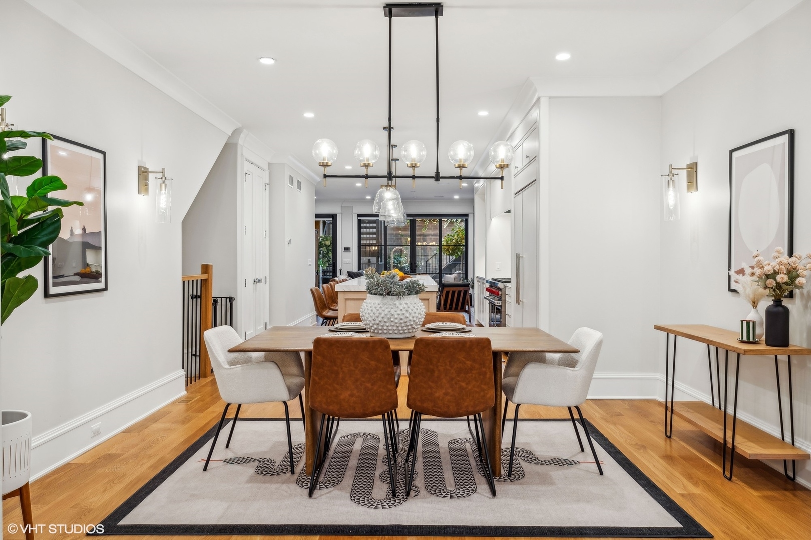 2034 North Mohawk Street, Unit 1 Chicago, IL 60614 - Photo 8 of 26 a view of a dining room with furniture window and wooden floor