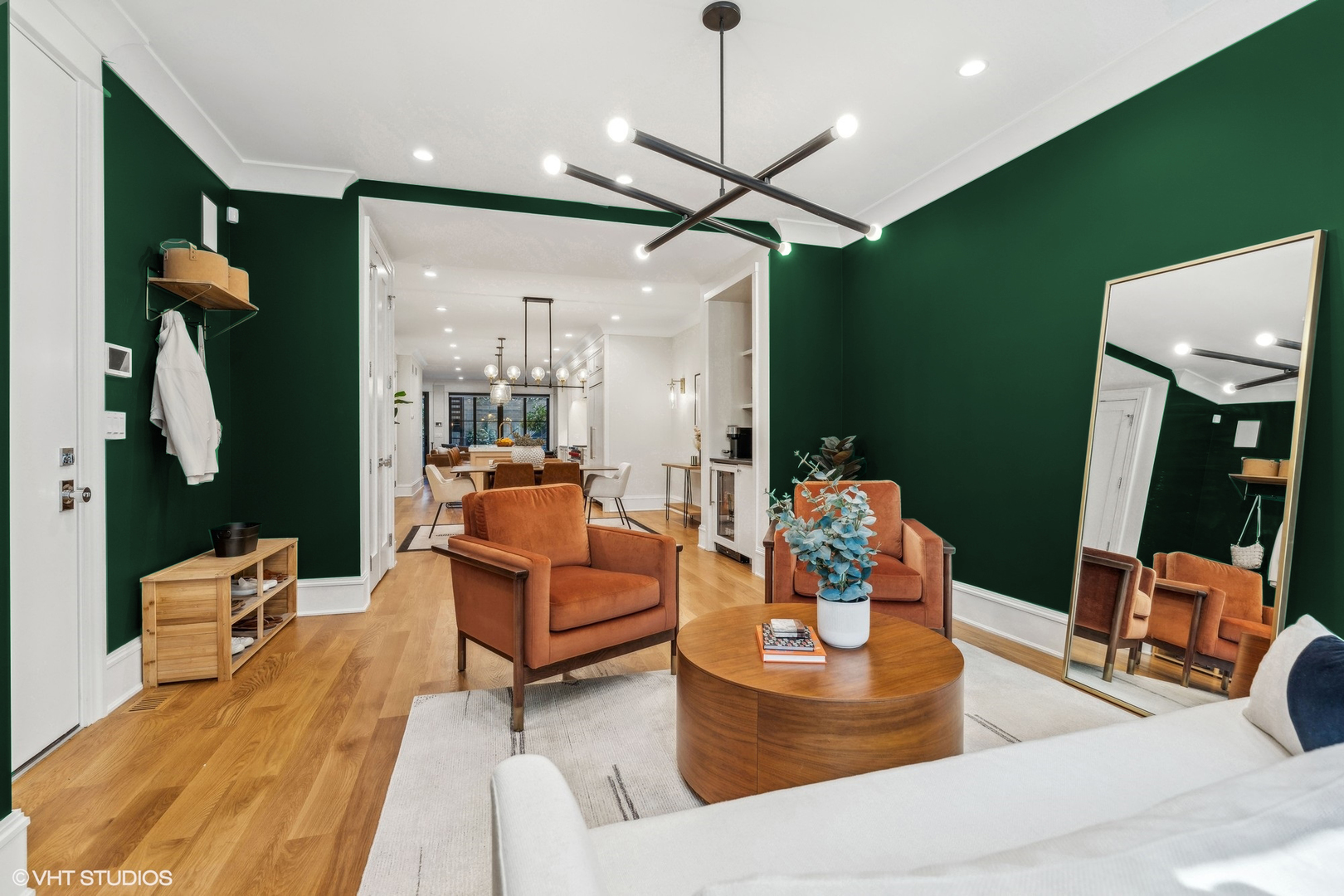 2034 North Mohawk Street, Unit 1 Chicago, IL 60614 - Photo 10 of 26 a living room with furniture and a chandelier
