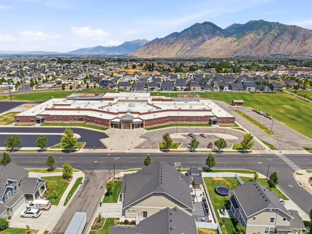 877 South Yarrow Drive Mapleton, UT 84664 - Photo 39 of 46 Expansive community featuring modern residential architecture and a large institutional building with brick and stone accents