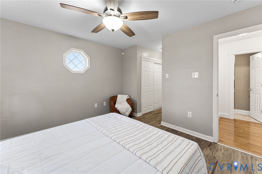 2010 Uleta Road Powhatan, VA 23139 - Photo 15 of 31 a bedroom with a bed and a chandelier