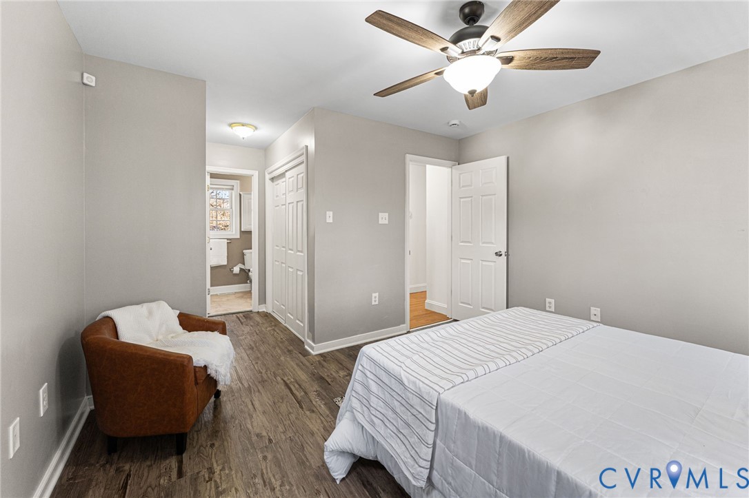 2010 Uleta Road Powhatan, VA 23139 - Photo 16 of 31 a bedroom with a bed and a chandelier